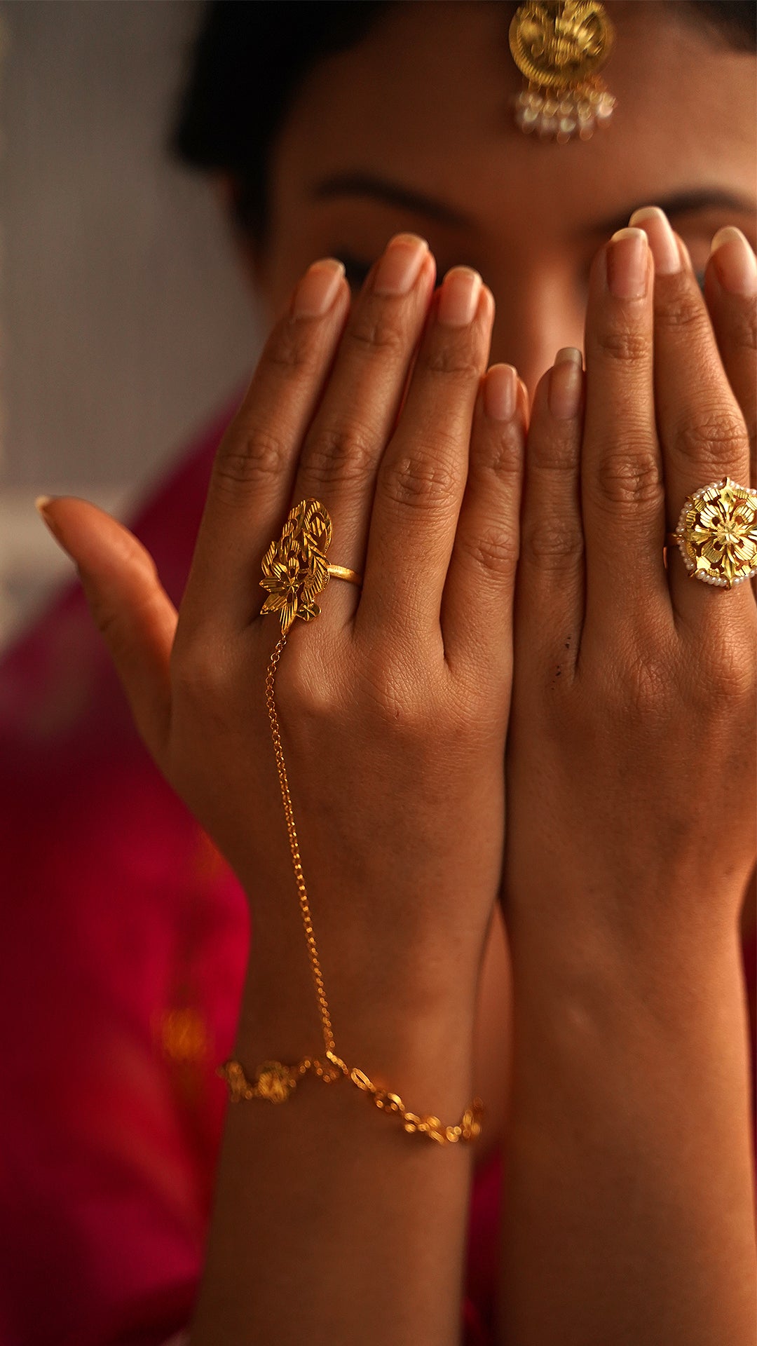 Hand jewellery on sale in gold